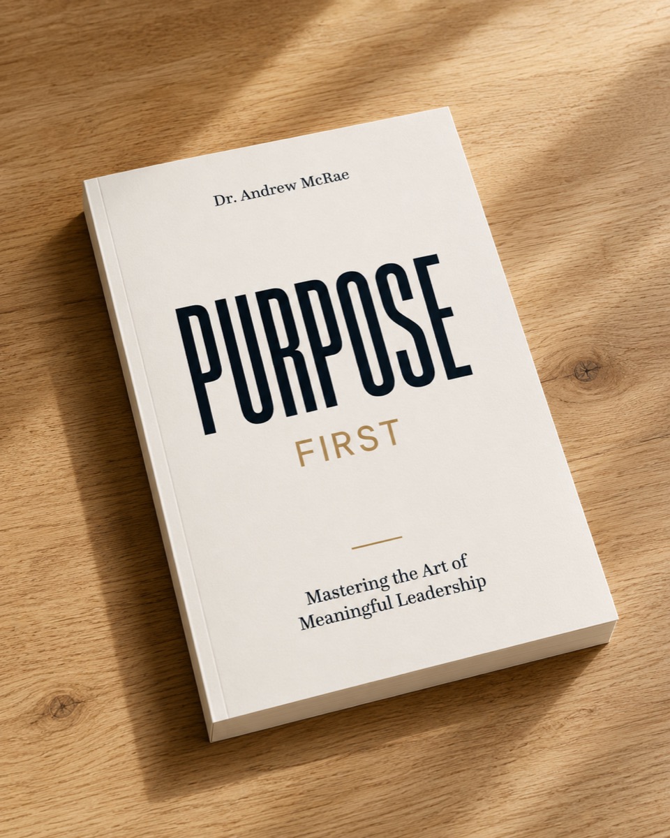 Purpose First paperback resting on a wooden desk
